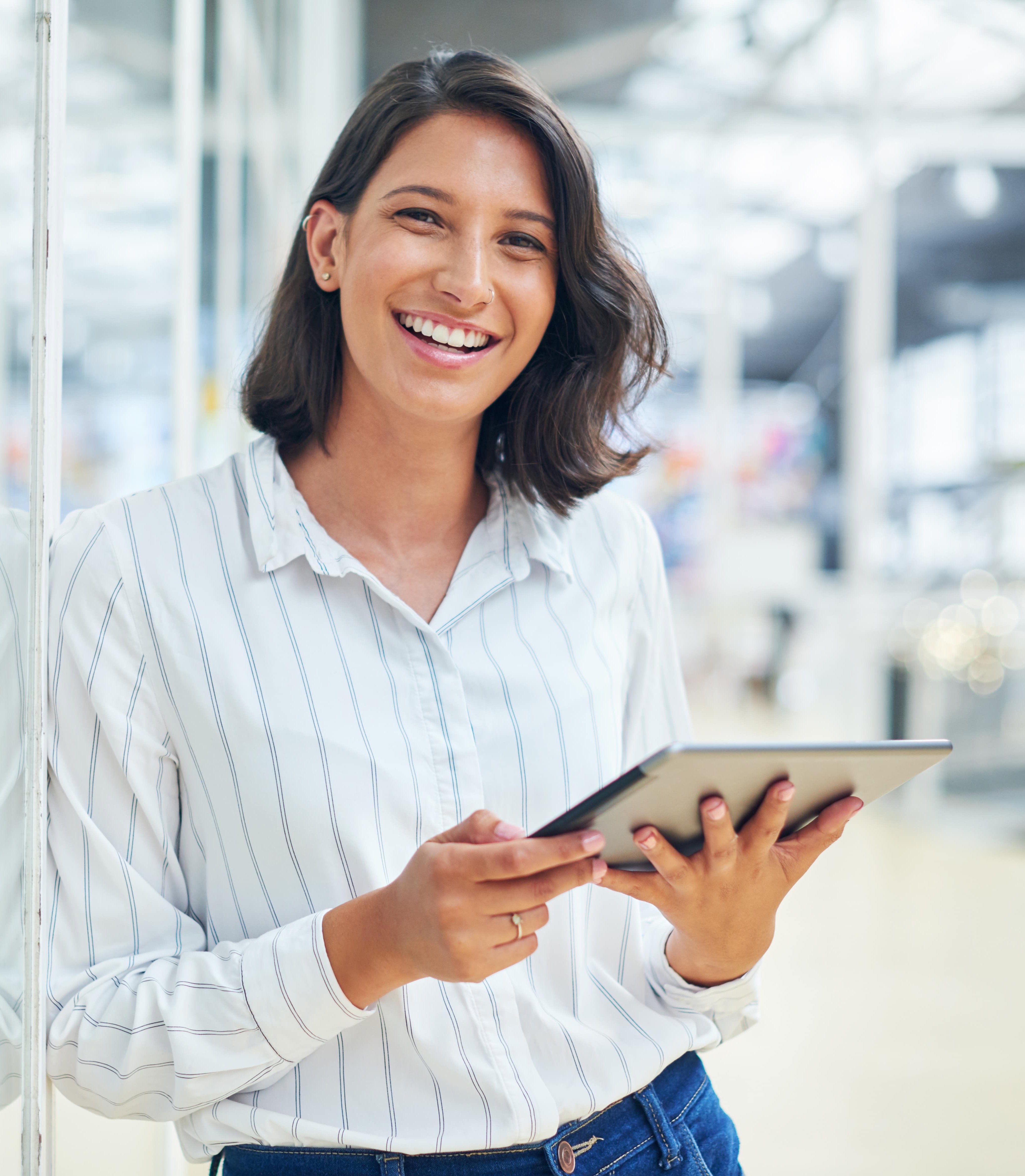 shot-of-a-young-businesswoman-using-a-digital-tabl-2022-10-06-02-02-28-utc-min